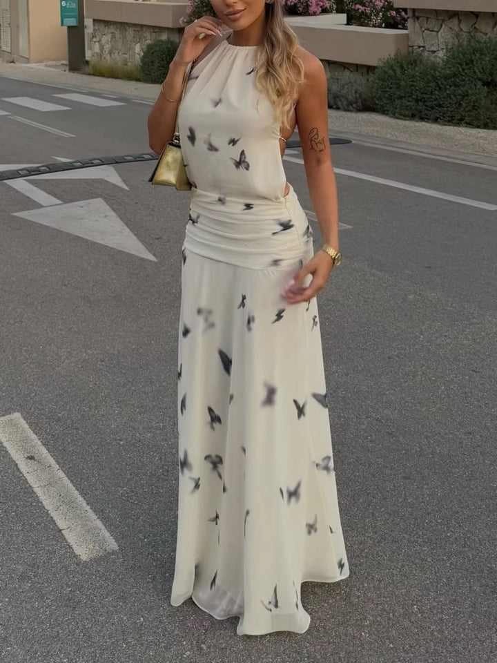 Dames halter maxi-jurk met vlinderprint en open rug met geplooide taille