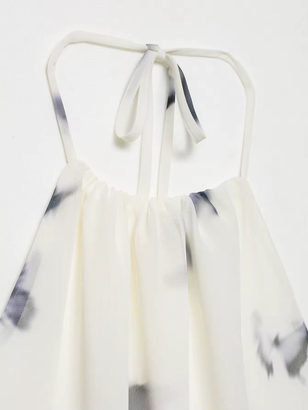 Dames halter maxi-jurk met vlinderprint en open rug met geplooide taille