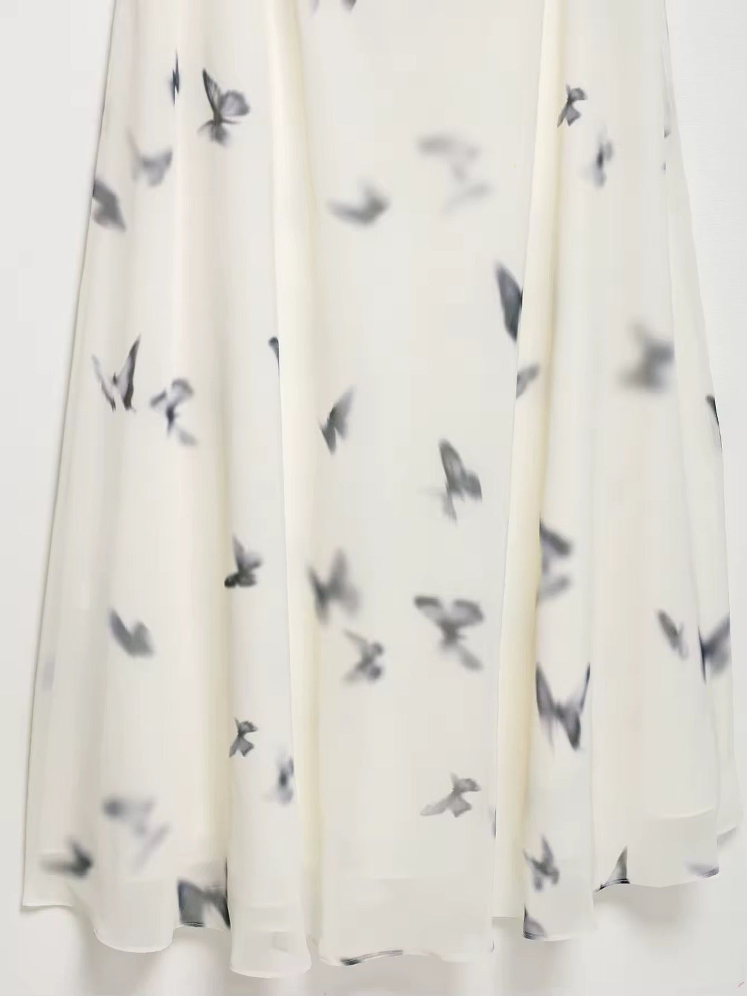 Dames halter maxi-jurk met vlinderprint en open rug met geplooide taille