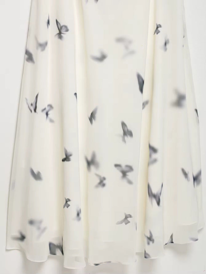 Dames halter maxi-jurk met vlinderprint en open rug met geplooide taille