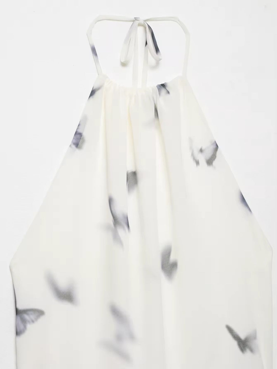 Dames halter maxi-jurk met vlinderprint en open rug met geplooide taille