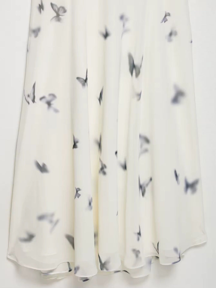 Dames halter maxi-jurk met vlinderprint en open rug met geplooide taille