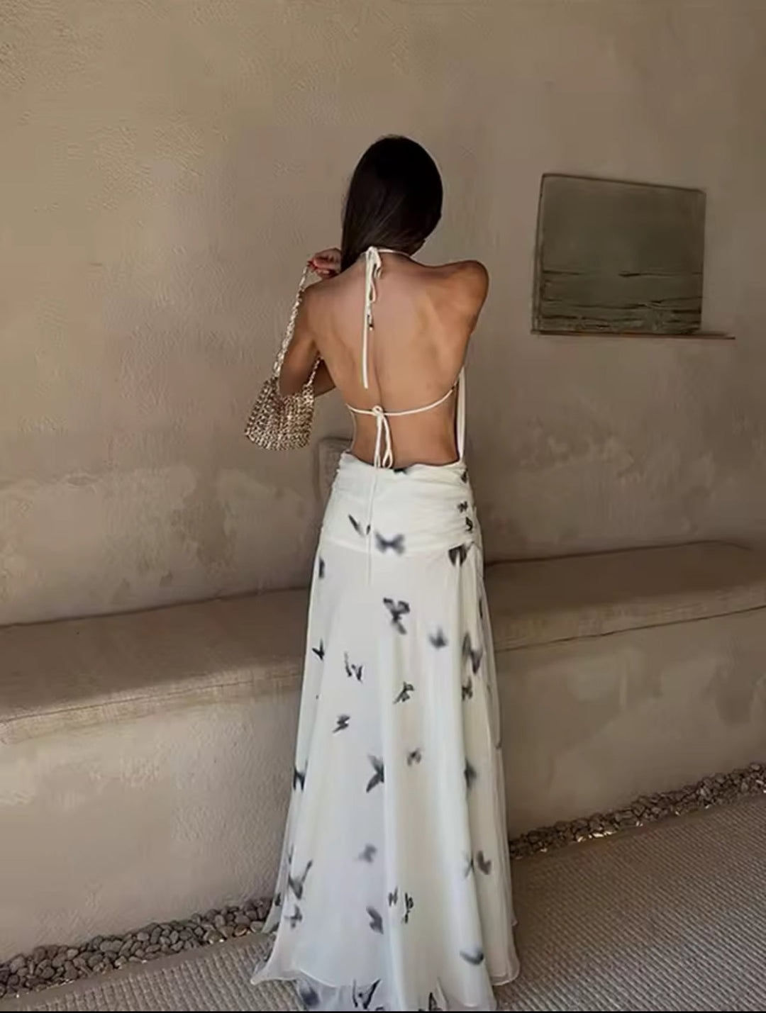 Dames halter maxi-jurk met vlinderprint en open rug met geplooide taille