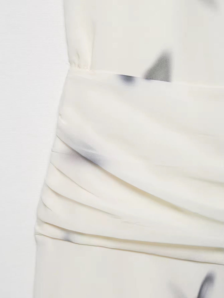 Dames halter maxi-jurk met vlinderprint en open rug met geplooide taille