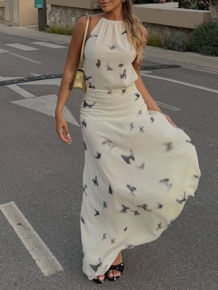 Dames halter maxi-jurk met vlinderprint en open rug met geplooide taille