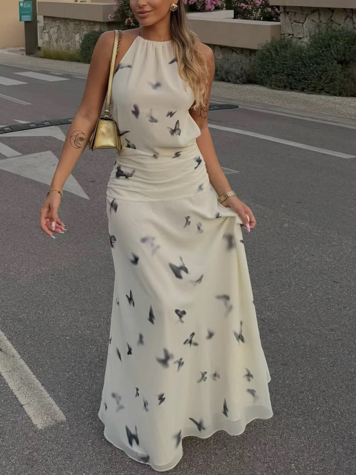 Dames halter maxi-jurk met vlinderprint en open rug met geplooide taille