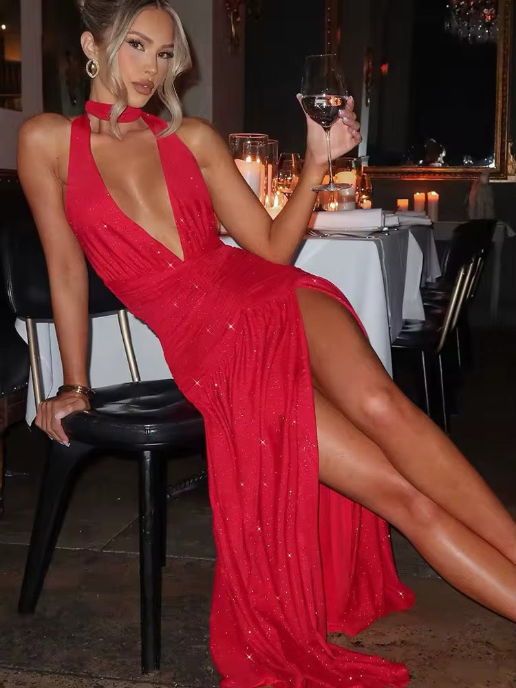 Dames halter maxijurk met diepe V-hals en glitteroppervlak met open rug en zijsplit
