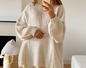 Damespullover met opstaande kraag, ballonmouwen en gestructureerde boorden