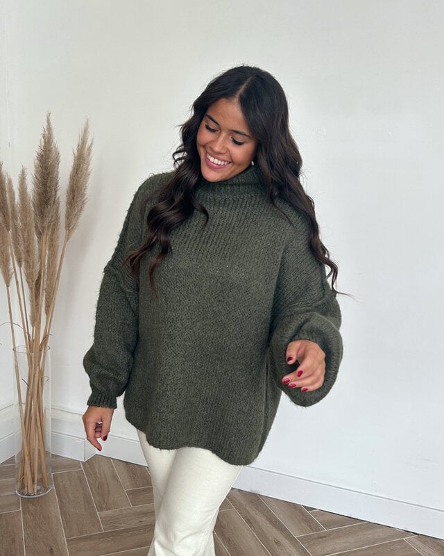 Damespullover met opstaande kraag, ballonmouwen en gestructureerde boorden