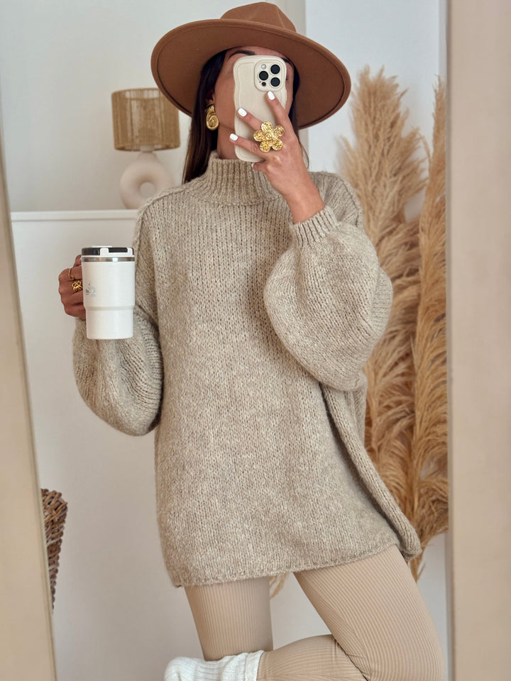 Damespullover met opstaande kraag, ballonmouwen en gestructureerde boorden