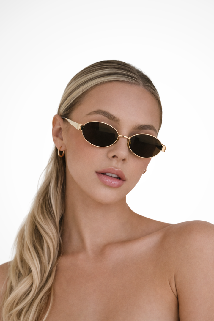 Damen Sonnenbrille mit ovalem Rahmen und Metallgestell