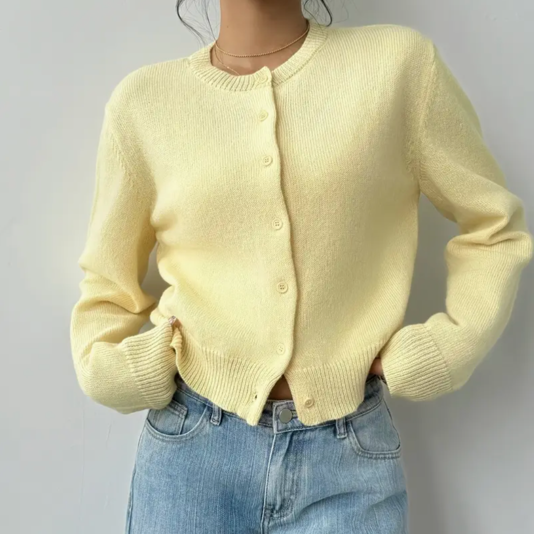 Damesvest met ronde hals, doorlopende knoopsluiting, lange mouwen met geribde boorden op tailleniveau