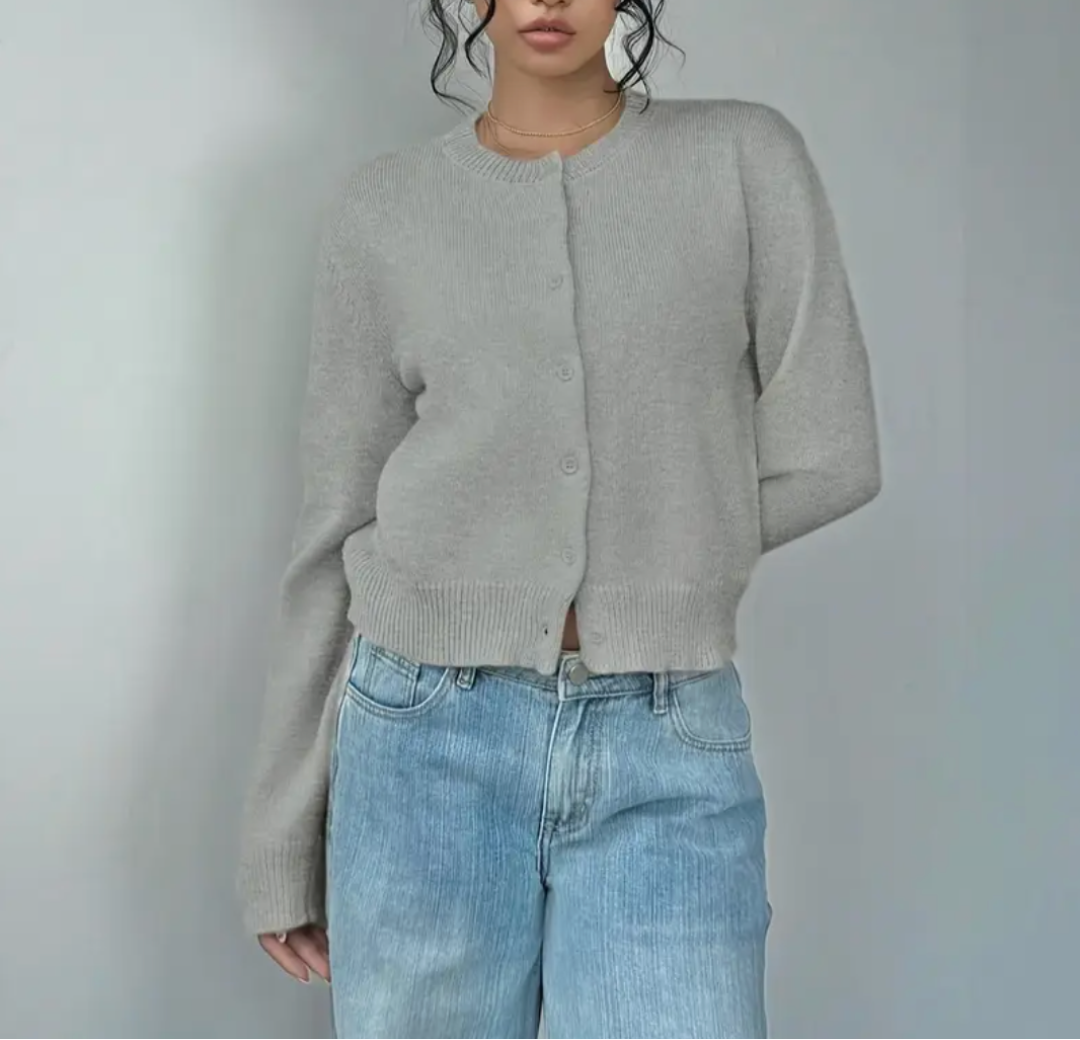 Damesvest met ronde hals, doorlopende knoopsluiting, lange mouwen met geribde boorden op tailleniveau