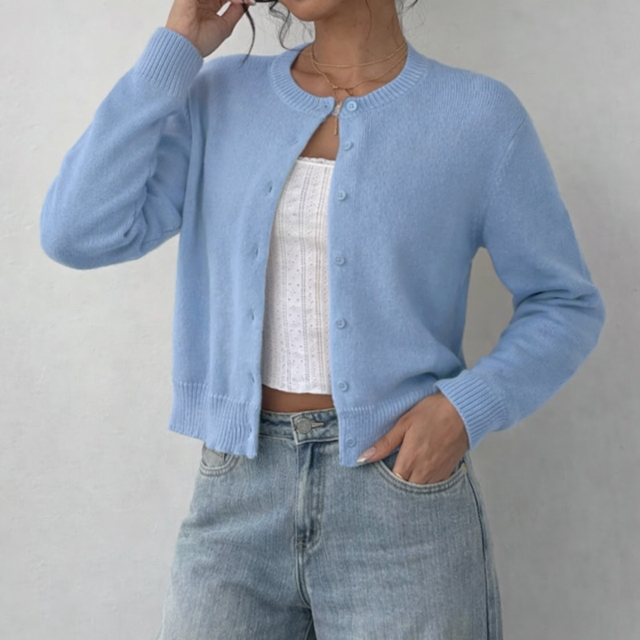 Damesvest met ronde hals, doorlopende knoopsluiting, lange mouwen met geribde boorden op tailleniveau