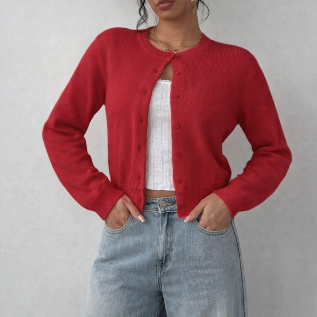 Damesvest met ronde hals, doorlopende knoopsluiting, lange mouwen met geribde boorden op tailleniveau