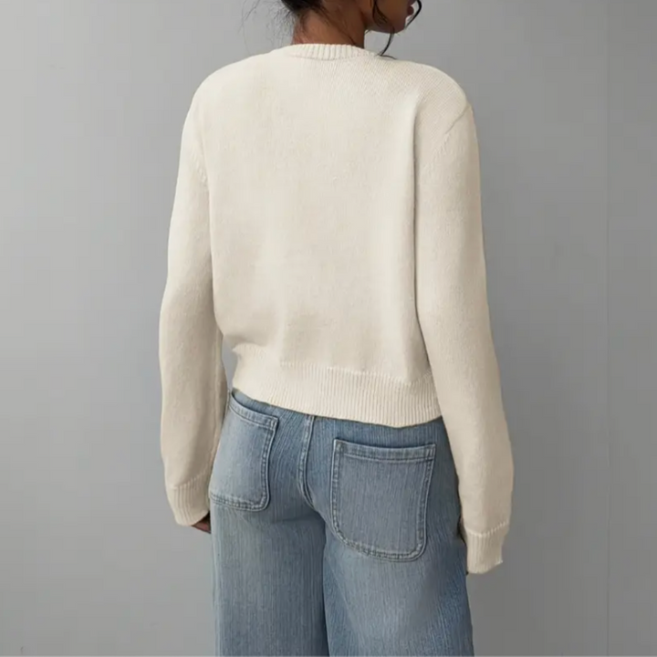 Damesvest met ronde hals, doorlopende knoopsluiting, lange mouwen met geribde boorden op tailleniveau