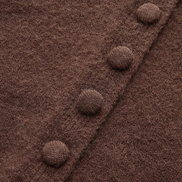Damesvest met ronde hals, knoopsluiting en lange mouwen