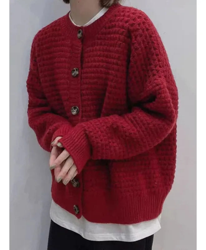 Damesvest met ronde hals, knoopsluiting, ballonmouwen en structuurpatroon