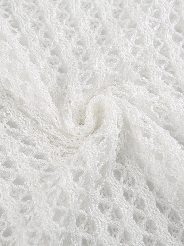 Gebreide damestop met ajourmotief, wijde halslijn, lange mouwen en kort model