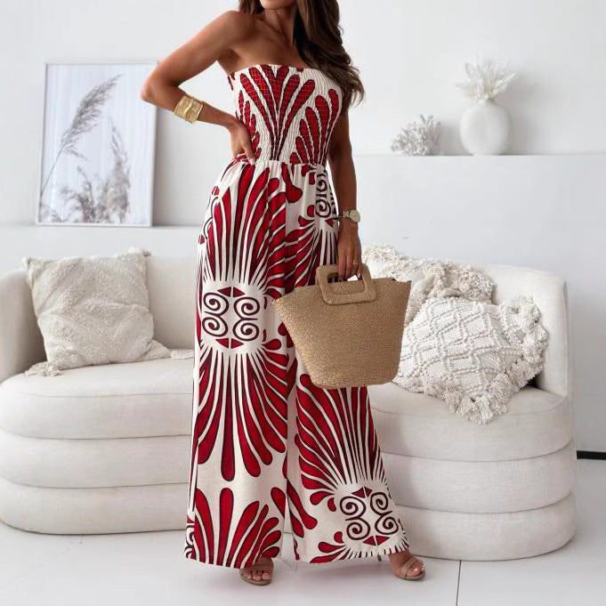 Dames strapless jumpsuit met wijde pijpen en abstracte print