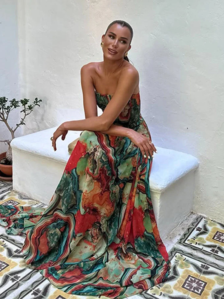 Dames strapless maxijurk met geplooide rok en print