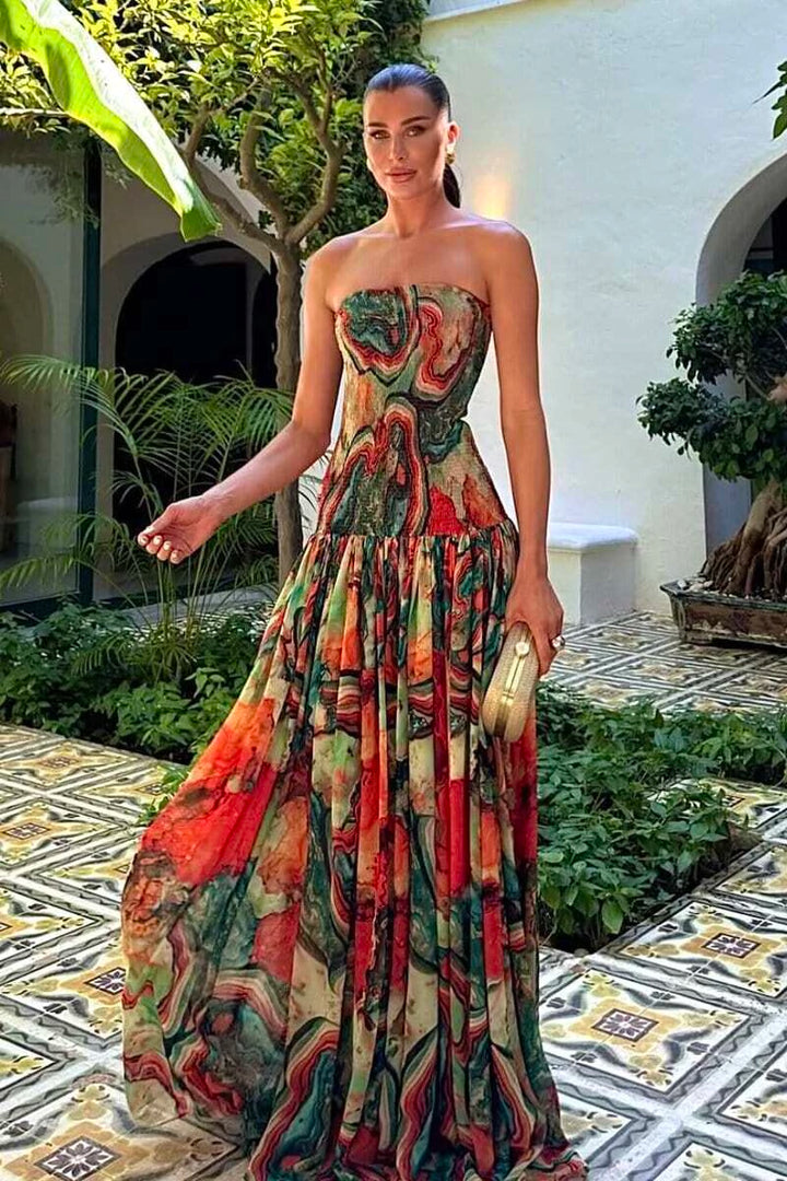 Dames strapless maxijurk met geplooide rok en print