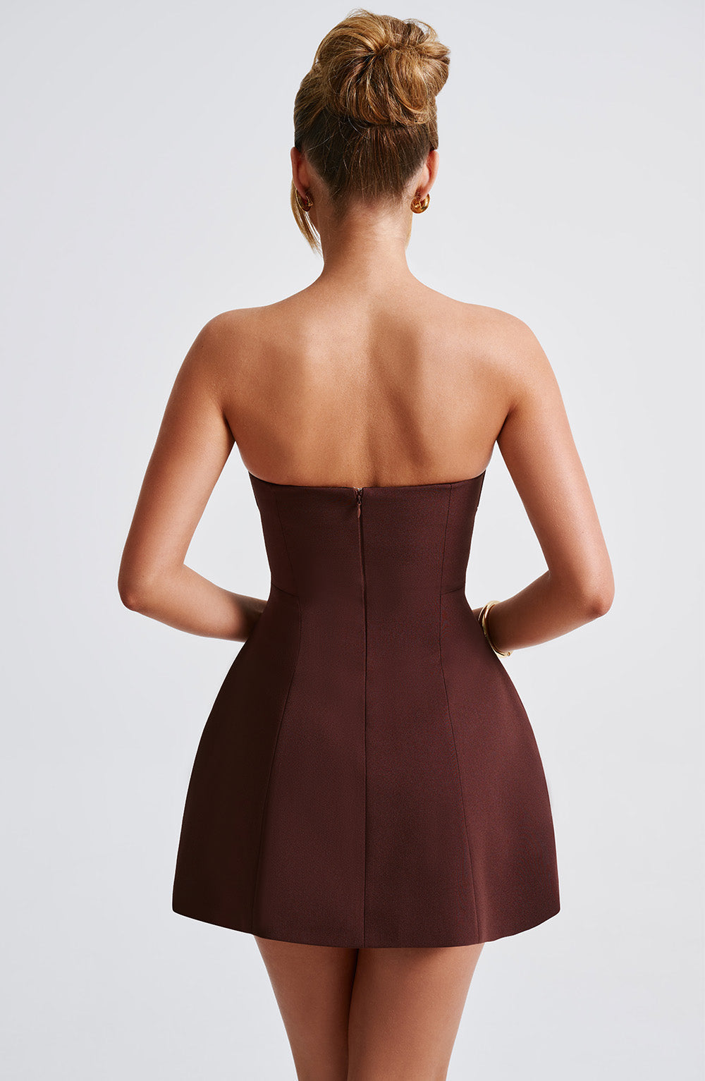 Dames strapless minijurk met paneelnaden en uitlopende rok