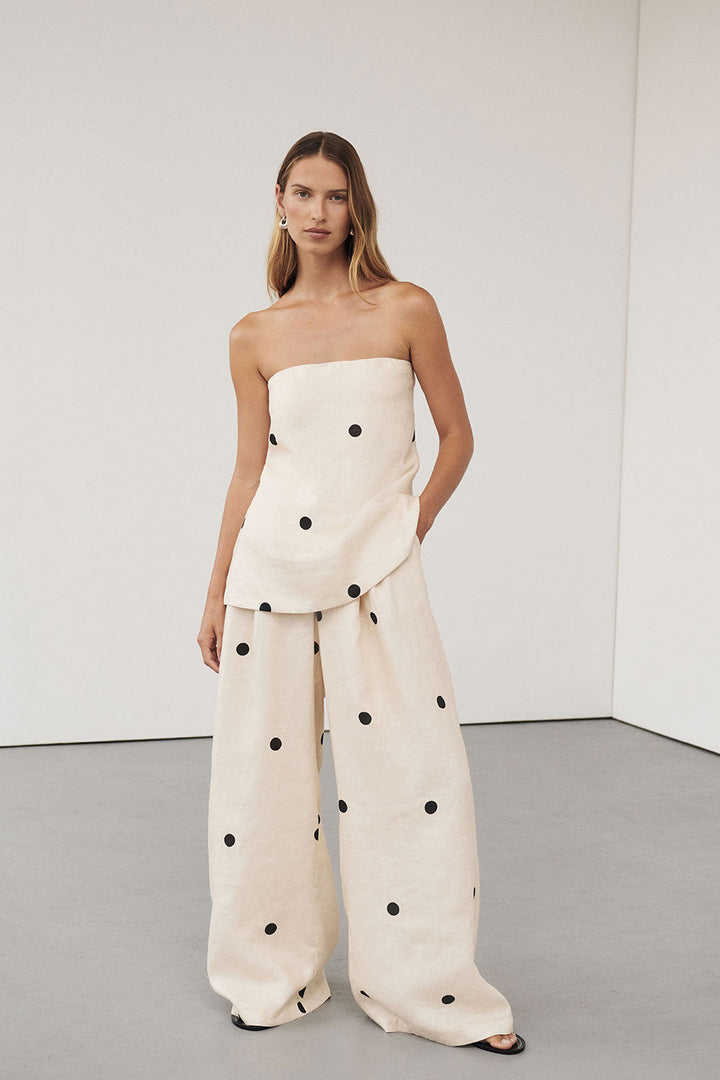 Dames strapless set met stippenpatroon, wijde broek en ritssluiting op de rug