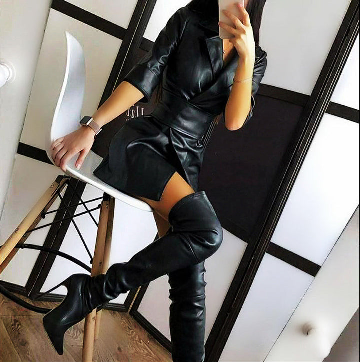 Dames wikkeljurk met reverskraag, tailleriem en driekwartmouwen