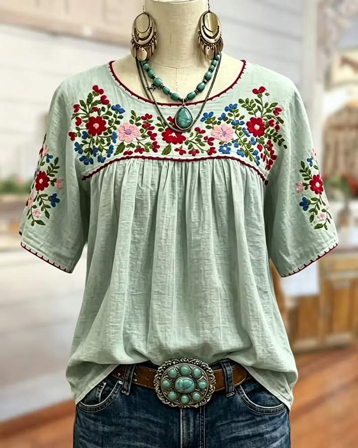 Frieda Damen Bluse mit Blumenstickerei und gerafftem Rundhalsausschnitt – Grün