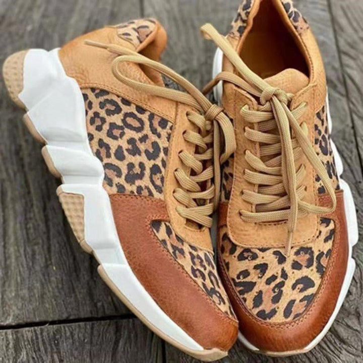 Laufschuhe Damen mit Animal-Print und Schnürung